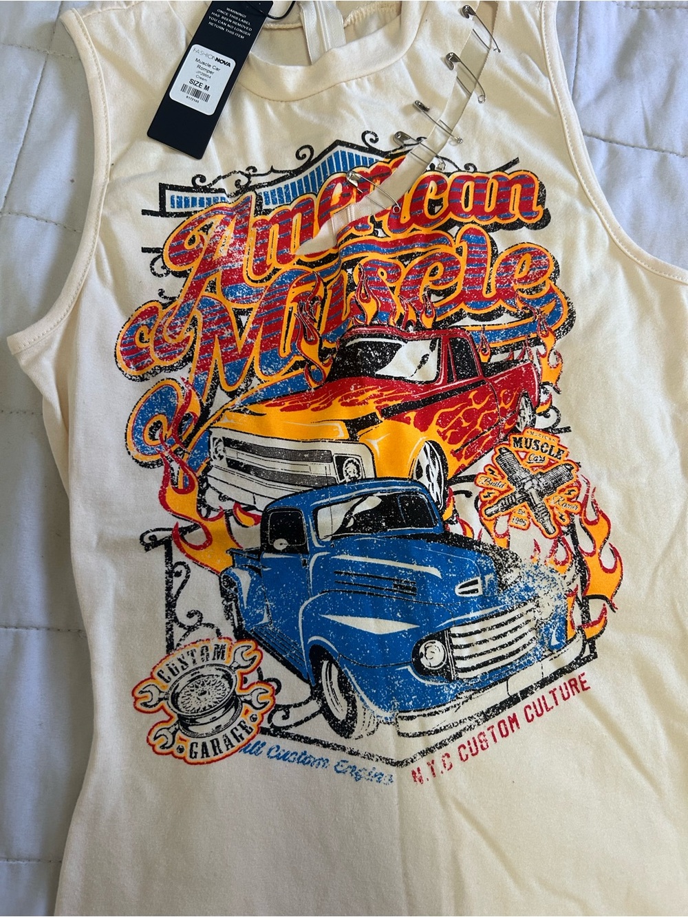 Fashion Nova Cream Romper with Red & Blue Car Graphic